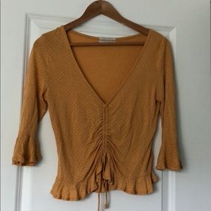 Urban Outfitters yellow polka dot top